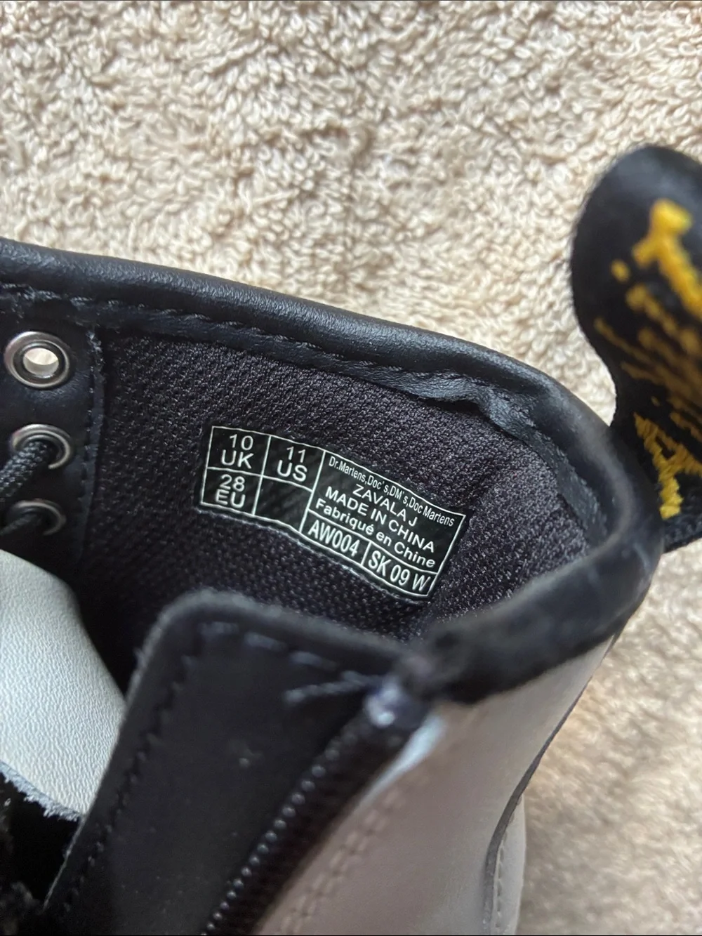 Dr. Martens 11 Kids White Lace-Up Combat Boots with Black Accents